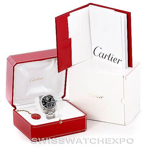 The image shows a Calibre de Cartier watch by Cartier in its red and white packaging box, along with a booklet and tag.