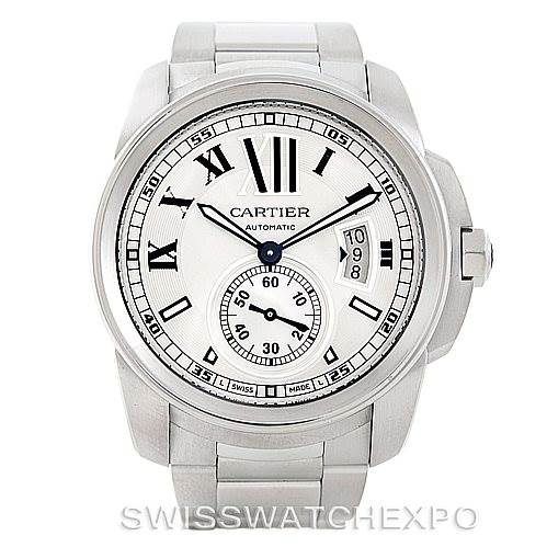 The image shows a front view of a Calibre de Cartier watch by Cartier, highlighting the face with Roman numerals and date indicator.