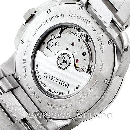 This image shows the back of a Calibre de Cartier watch by Cartier, highlighting its automatic movement and stainless steel case.