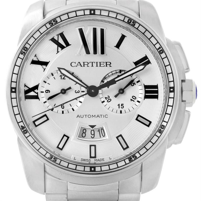 The image shows a front view of the Calibre de Cartier model by Cartier, showcasing its dial, hands, and date display.