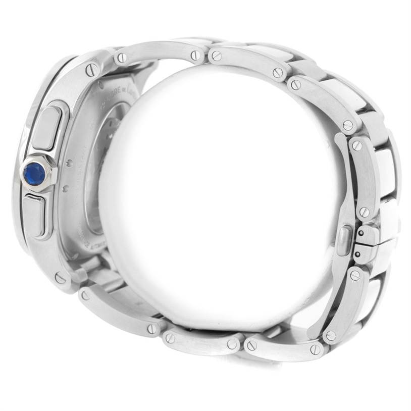 This is a side profile view of a Calibre de Cartier watch by Cartier, showcasing the links and case side with the crown.