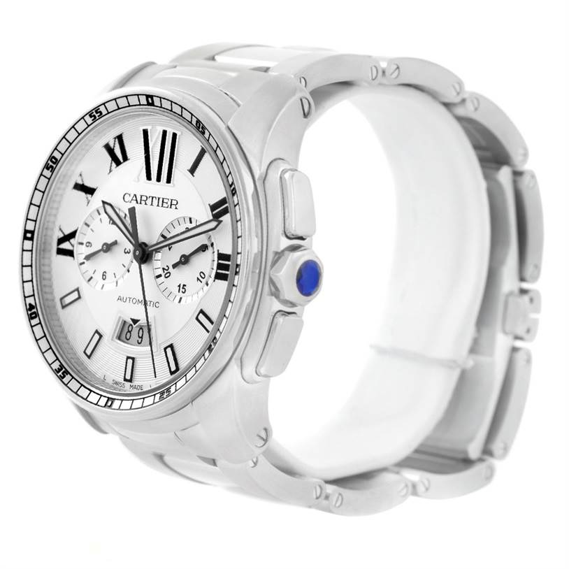 The image shows a 3/4 angled view of the Calibre de Cartier watch by Cartier, displaying the face, crown, and part of the bracelet.