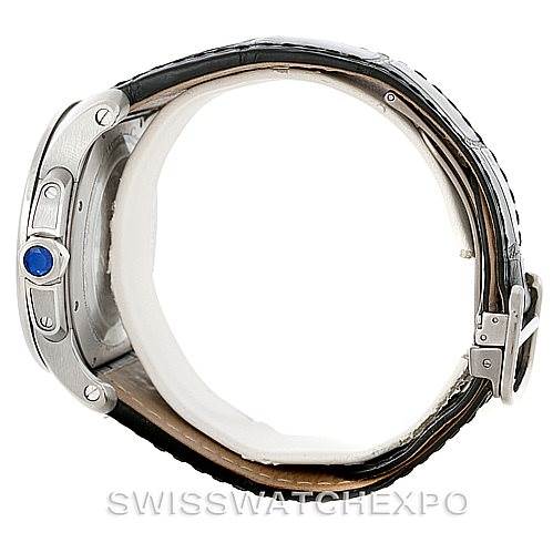 The image shows a side view of a Calibre de Cartier watch by Cartier, highlighting the crown, case, and leather strap.