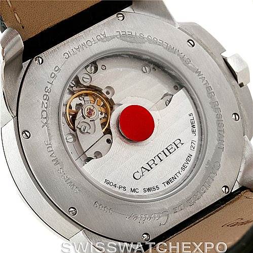 This image shows the case back of a Calibre de Cartier watch, displaying the movement and engravings.