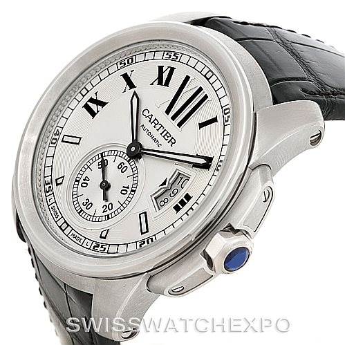 This image depicts a Calibre de Cartier model by Cartier from a front-left angle, showing the watch face, crown, and part of the strap.