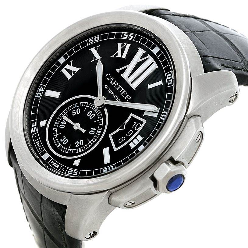 The image shows a side angle of a Calibre de Cartier watch by Cartier, highlighting the dial, bezel, crown, and leather strap.