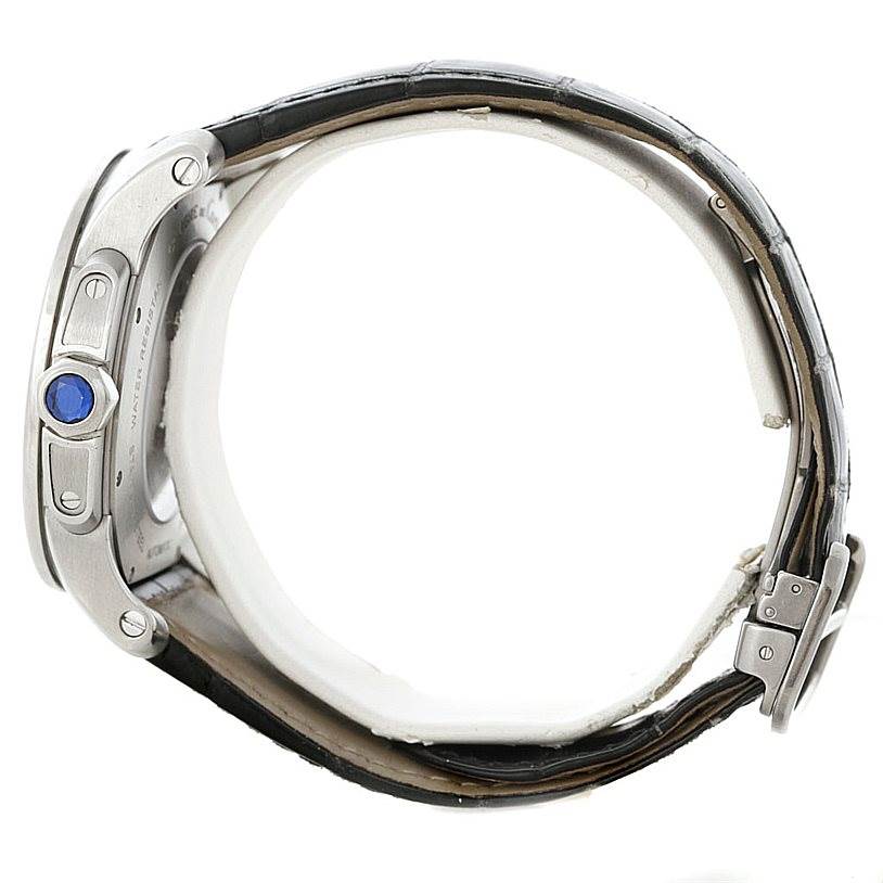 The image shows a side profile of the Calibre de Cartier watch by Cartier, highlighting the crown and part of the strap.