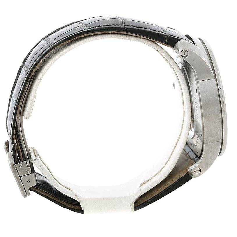 The image shows a side view of the Calibre de Cartier watch by Cartier, highlighting the strap and casing side.