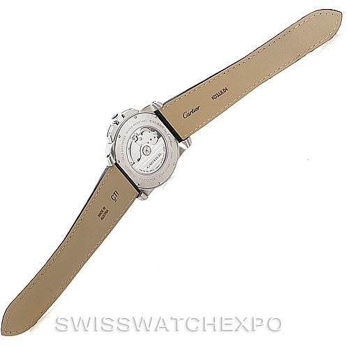 The image shows the back view of a Calibre de Cartier watch by Cartier, highlighting the transparent case back and leather strap.