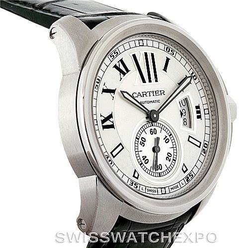 The image shows a side perspective of the Calibre de Cartier watch by Cartier, highlighting its dial, case, and part of the strap.