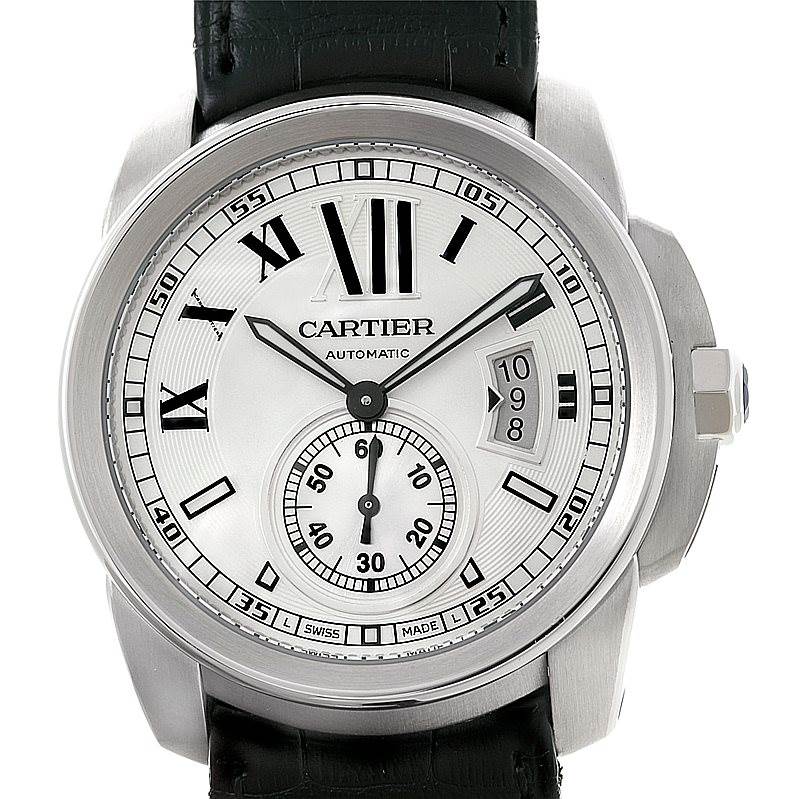 The image shows a front view of a Calibre de Cartier by Cartier, displaying the dial, hands, and date sub-dial.