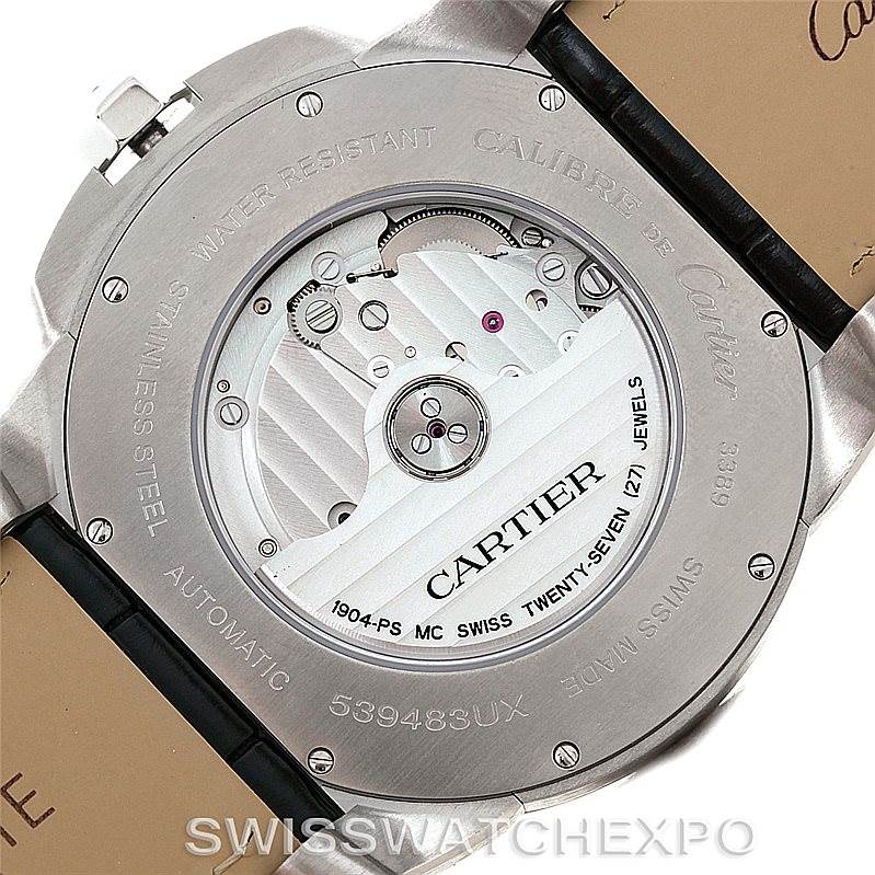 This image shows the back view of the Calibre de Cartier watch by Cartier, highlighting its automatic movement and internal mechanisms.