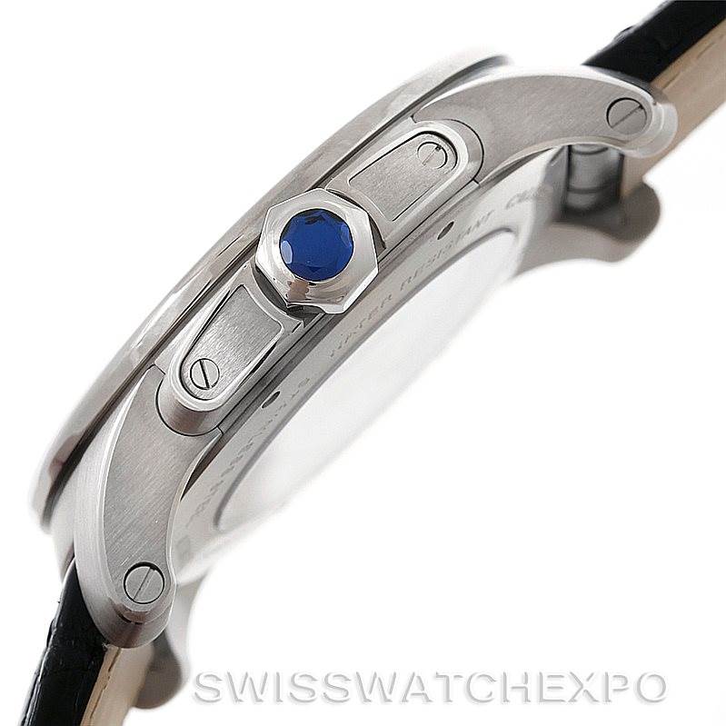 This image shows the side view of a Calibre de Cartier watch by Cartier, highlighting its crown and screws.