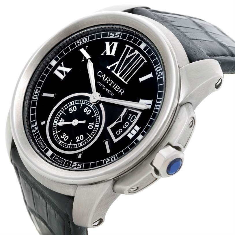 This image shows a close-up angle of the front and right side of the Calibre de Cartier watch by Cartier, highlighting the dial and crown.