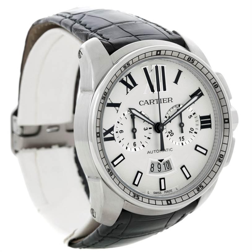 The Calibre de Cartier watch by Cartier is shown at a front angle, displaying the dial, watch face, and part of the strap.