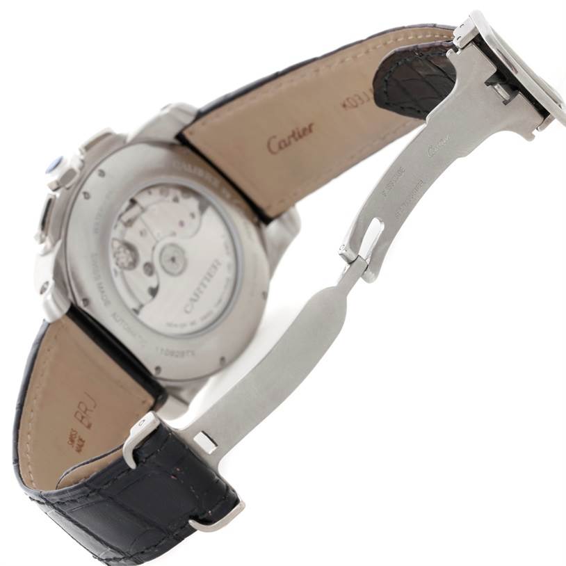 The image shows the back and interior parts of the strap of a Calibre de Cartier watch by Cartier.