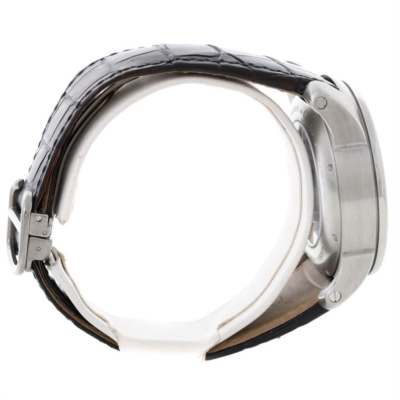 This image shows a side view of a Calibre de Cartier watch by Cartier, focusing on the case, strap, and buckle.