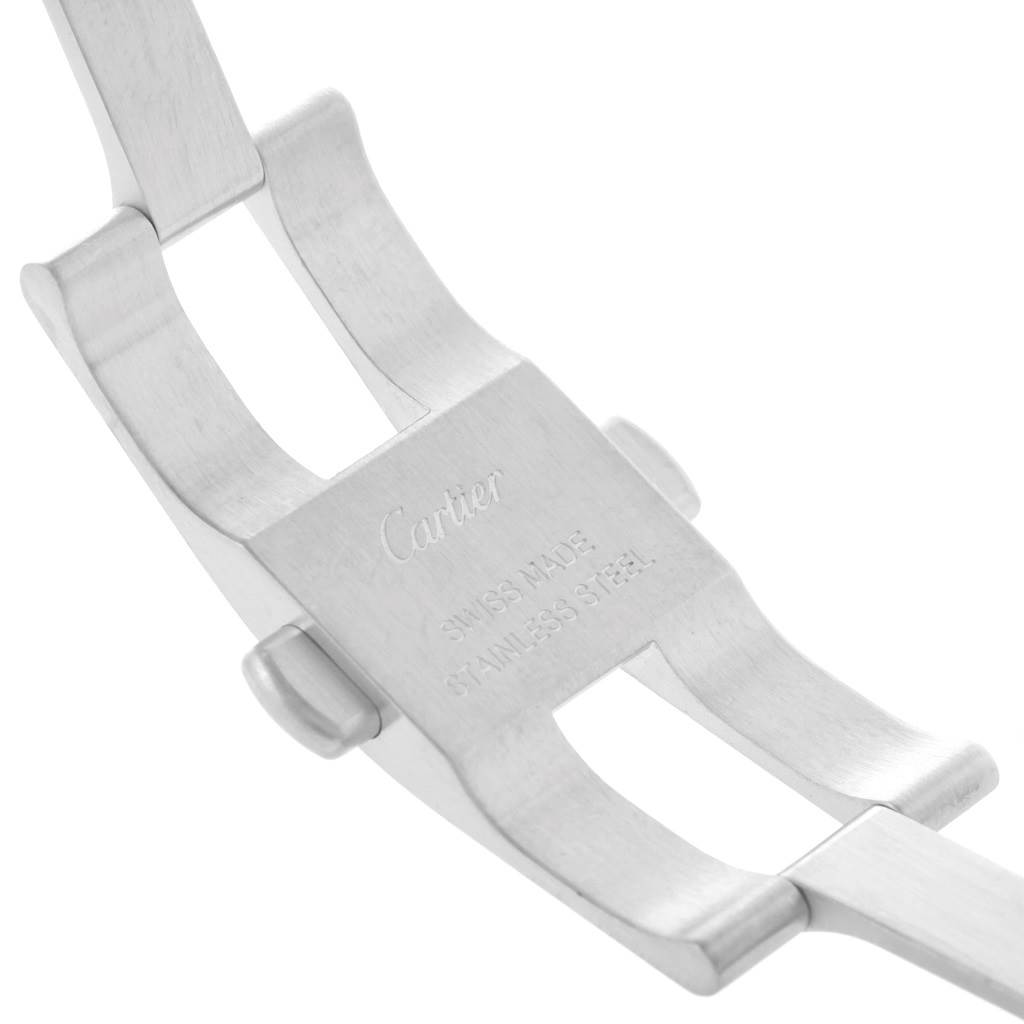 This image shows a close-up of the clasp mechanism of the Calibre de Cartier watch by Cartier.