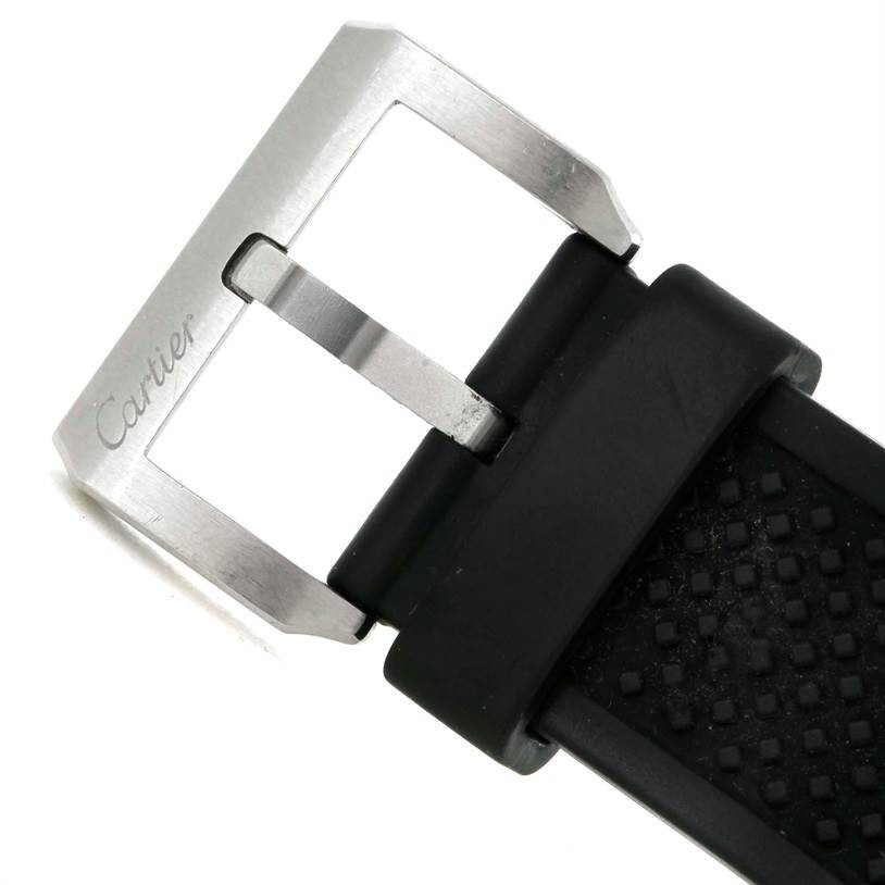 This image shows the buckle and part of the strap of a Calibre de Cartier watch by Cartier from a close-up angle.