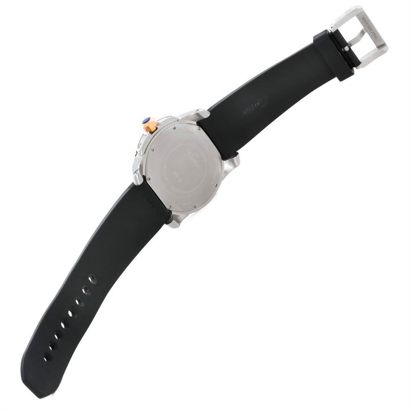 The image shows the back and the strap of a Calibre de Cartier watch by Cartier.