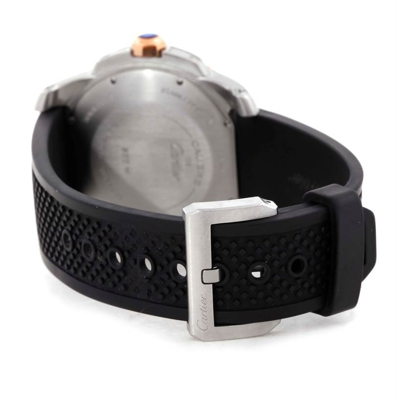 The image shows the back and buckle of a Calibre de Cartier watch by Cartier.