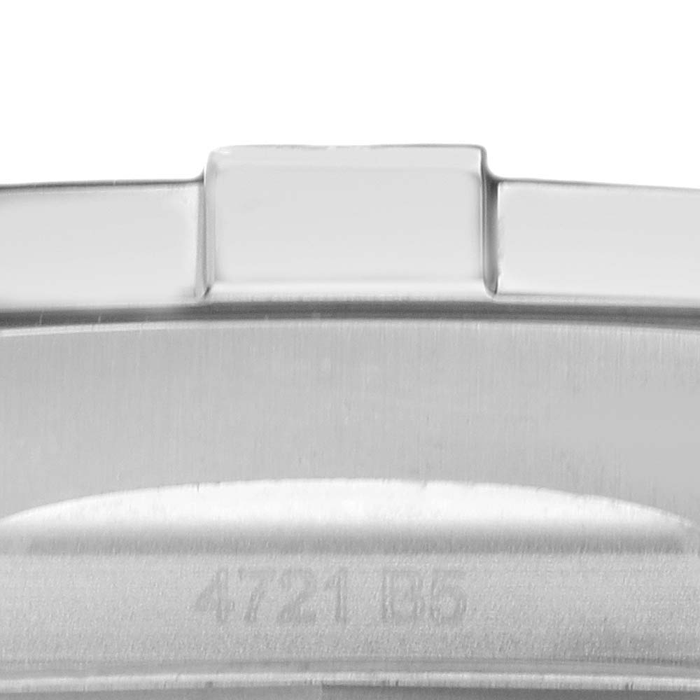 This image shows a close-up of the engraved serial number on the side of a Breitling Avenger A17318 Men's Stainless Steel Blue Dial A17318 Men's Stainless Steel Blue Dial watch bezel.