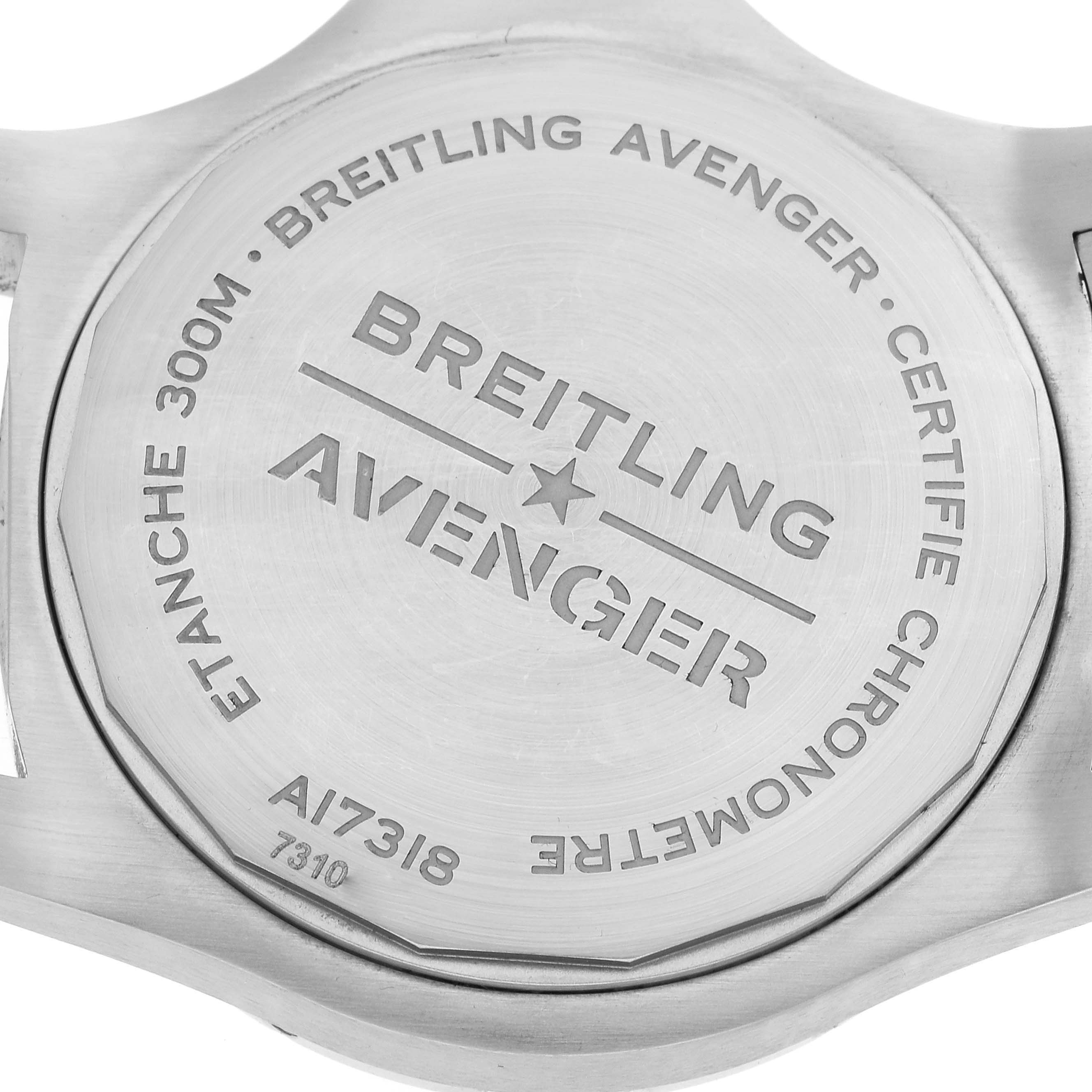 The image shows the back case of a Breitling Avenger A17318 Men's Stainless Steel Blue Dial A17318 Men's Stainless Steel Blue Dial watch, engraved with brand and model details.