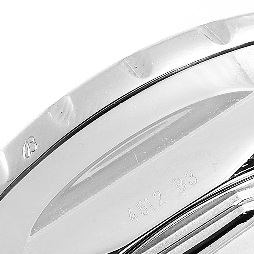 This image shows a close-up of the bezel and part of the case back with engravings of the Breitling Bentley A13365 Men's Stainless Steel Black Dial A13365 Men's Stainless Steel Black Dial model watch.