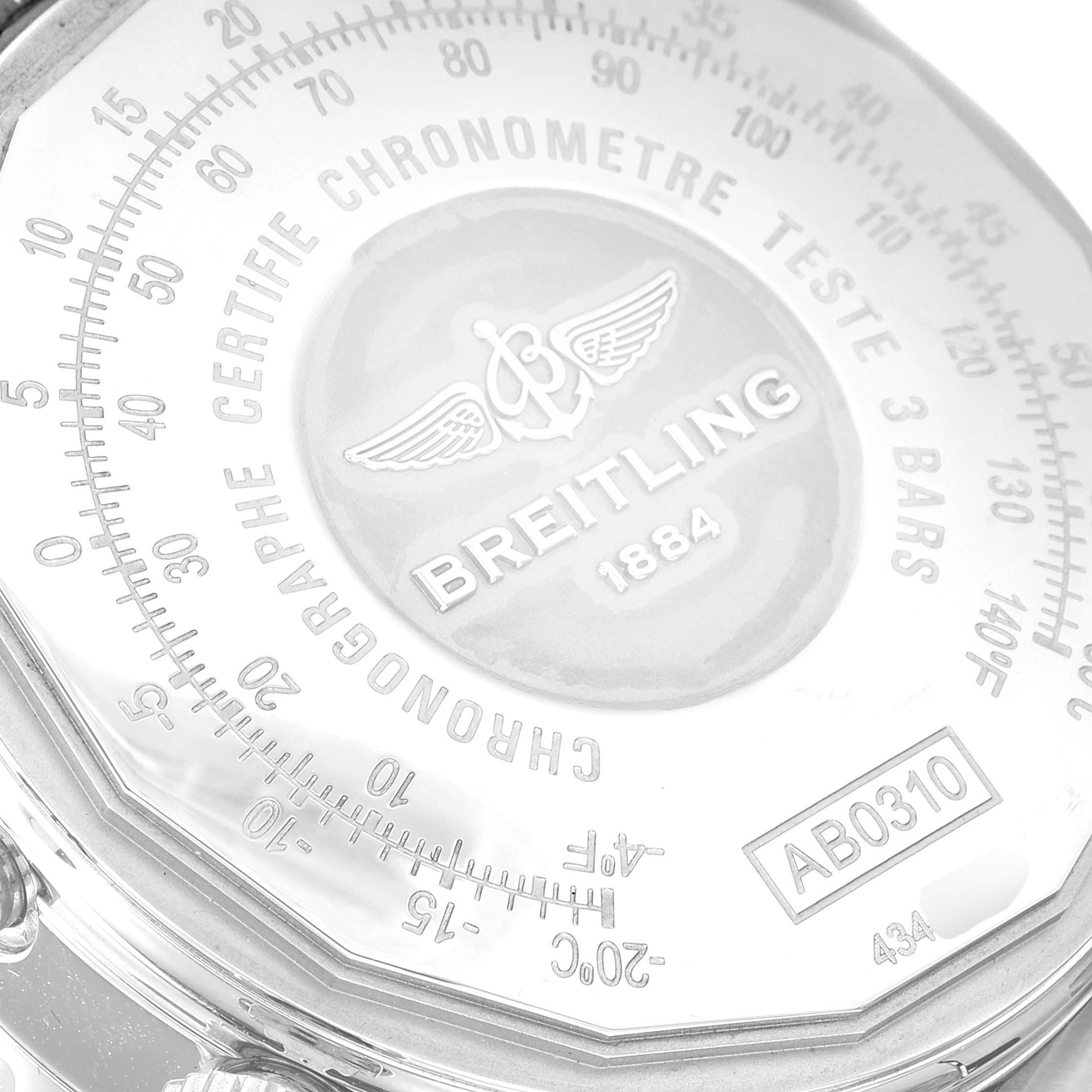 This close-up image shows the back case of a Breitling Navitimer AB0310 Men's Stainless Steel Black Dial AB0310 Men's Stainless Steel Black Dial watch, highlighting its branding and markings.