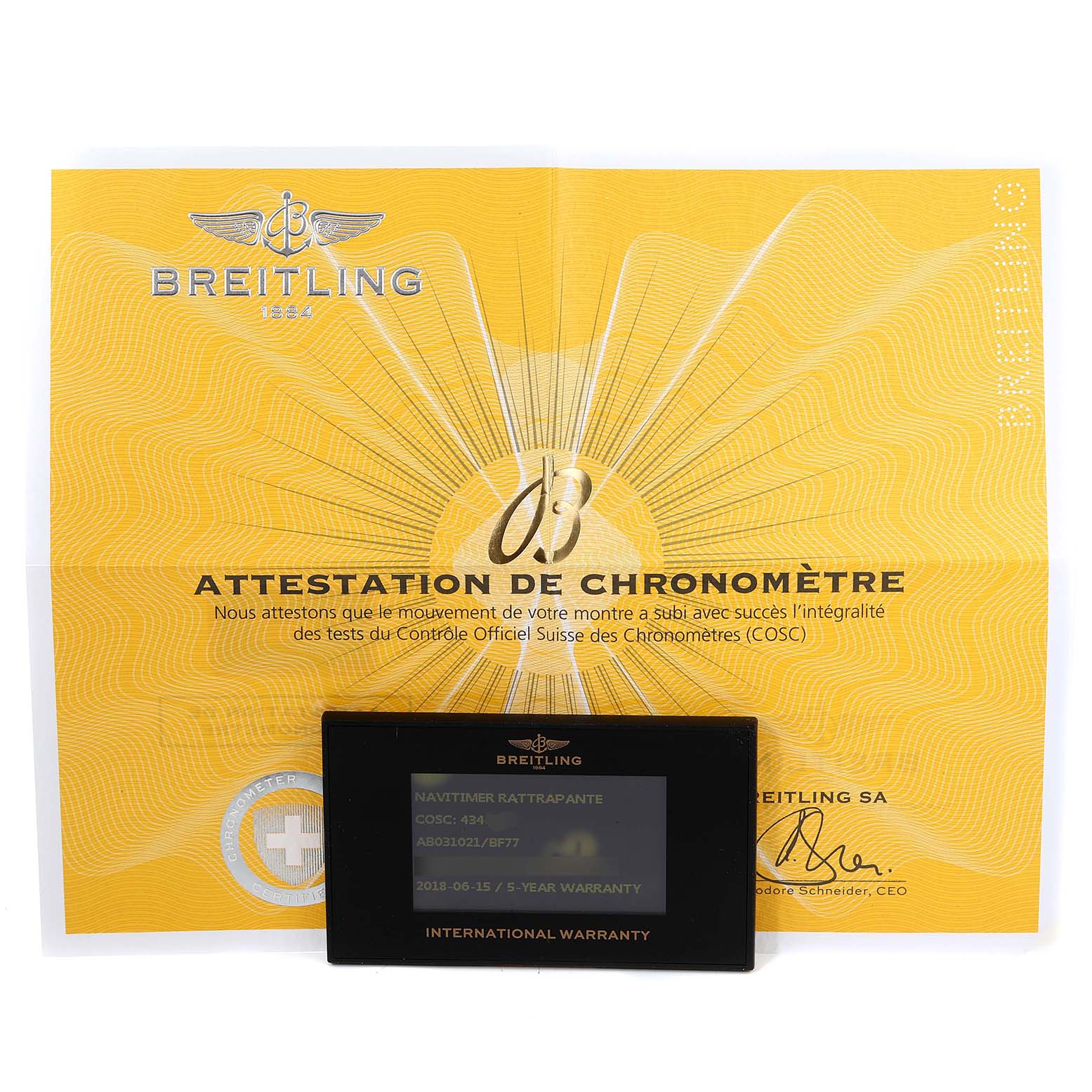 The image shows the warranty card and chronometer certification for the Breitling Navitimer AB0310 Men's Stainless Steel Black Dial AB0310 Men's Stainless Steel Black Dial watch, model Rattrapante.