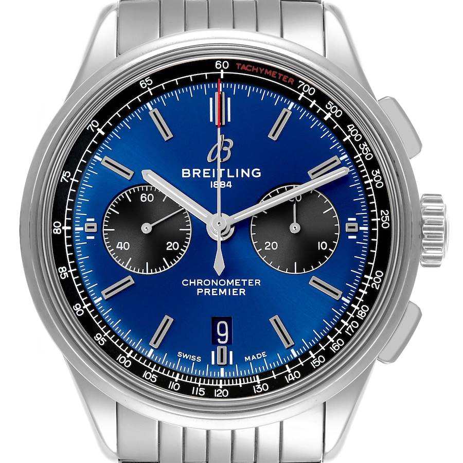 The Breitling Premier watch is shown from the front, featuring a blue dial, chronograph subdials, tachymeter scale, and metal bracelet.