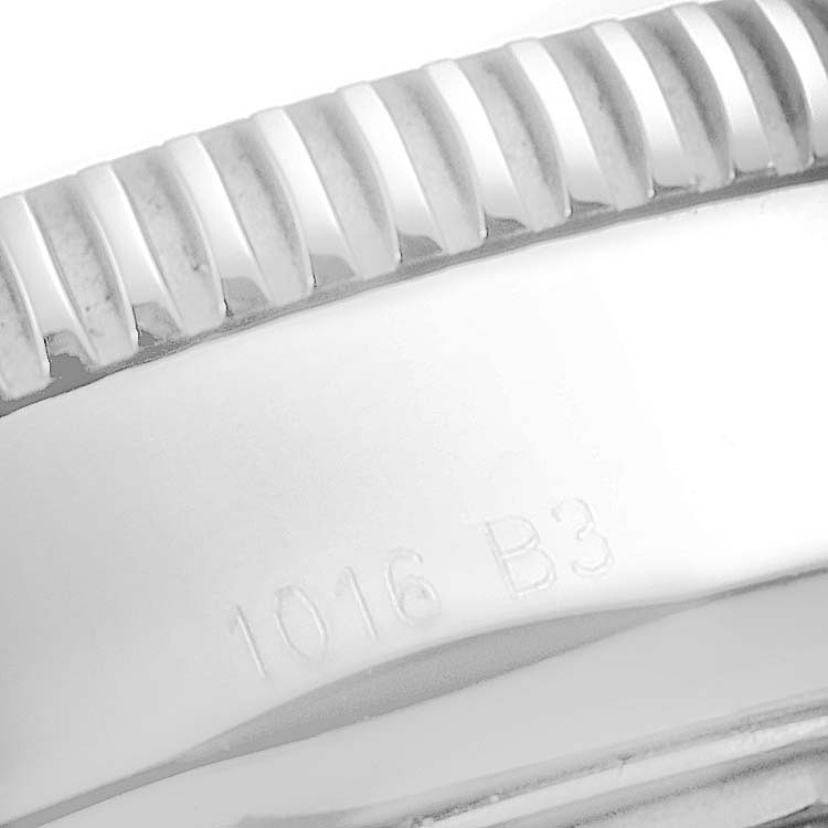 The image shows a close-up of the bezel and case side of a Breitling Superocean A17320 Men's Stainless Steel Black Dial A17320 Men's Stainless Steel Black Dial watch, featuring the engraved number "1016 B3."