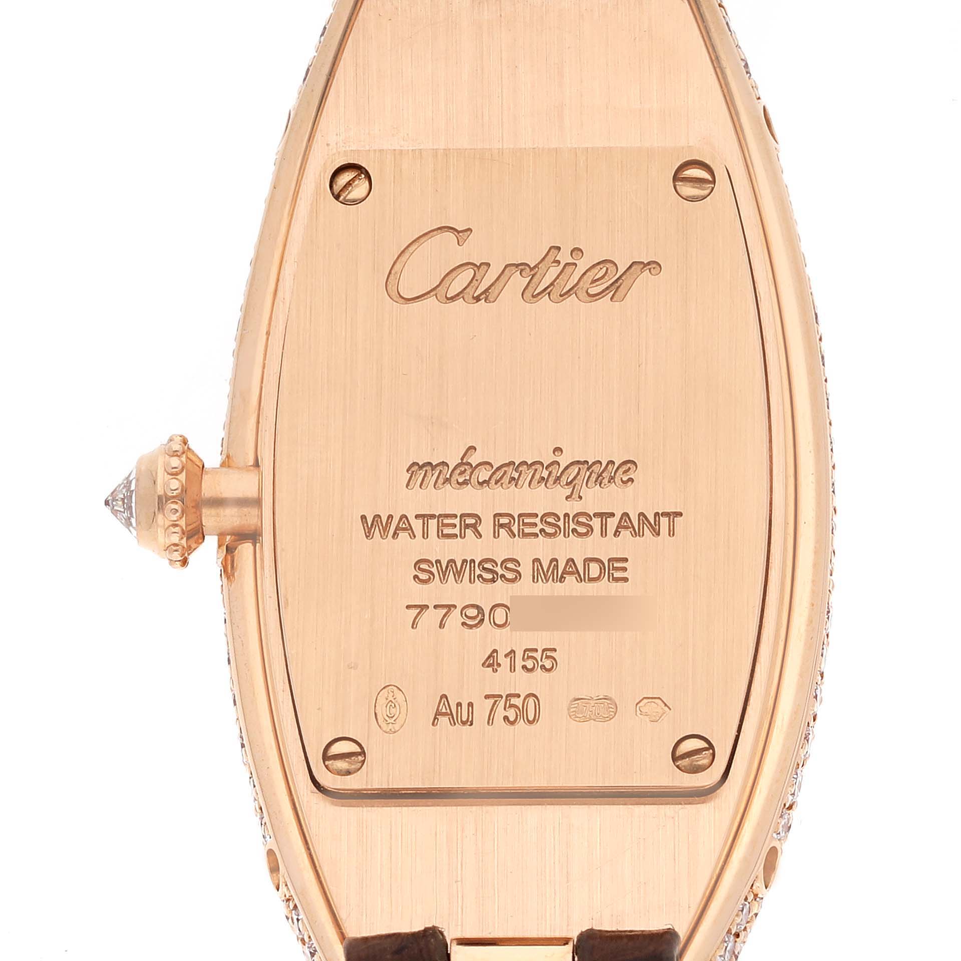 The image shows the back of a Cartier Baignoire WJBA0006 Women's Rose Gold White Dial WJBA0006 Women's Rose Gold White Dial watch, highlighting its inscriptions and crown.