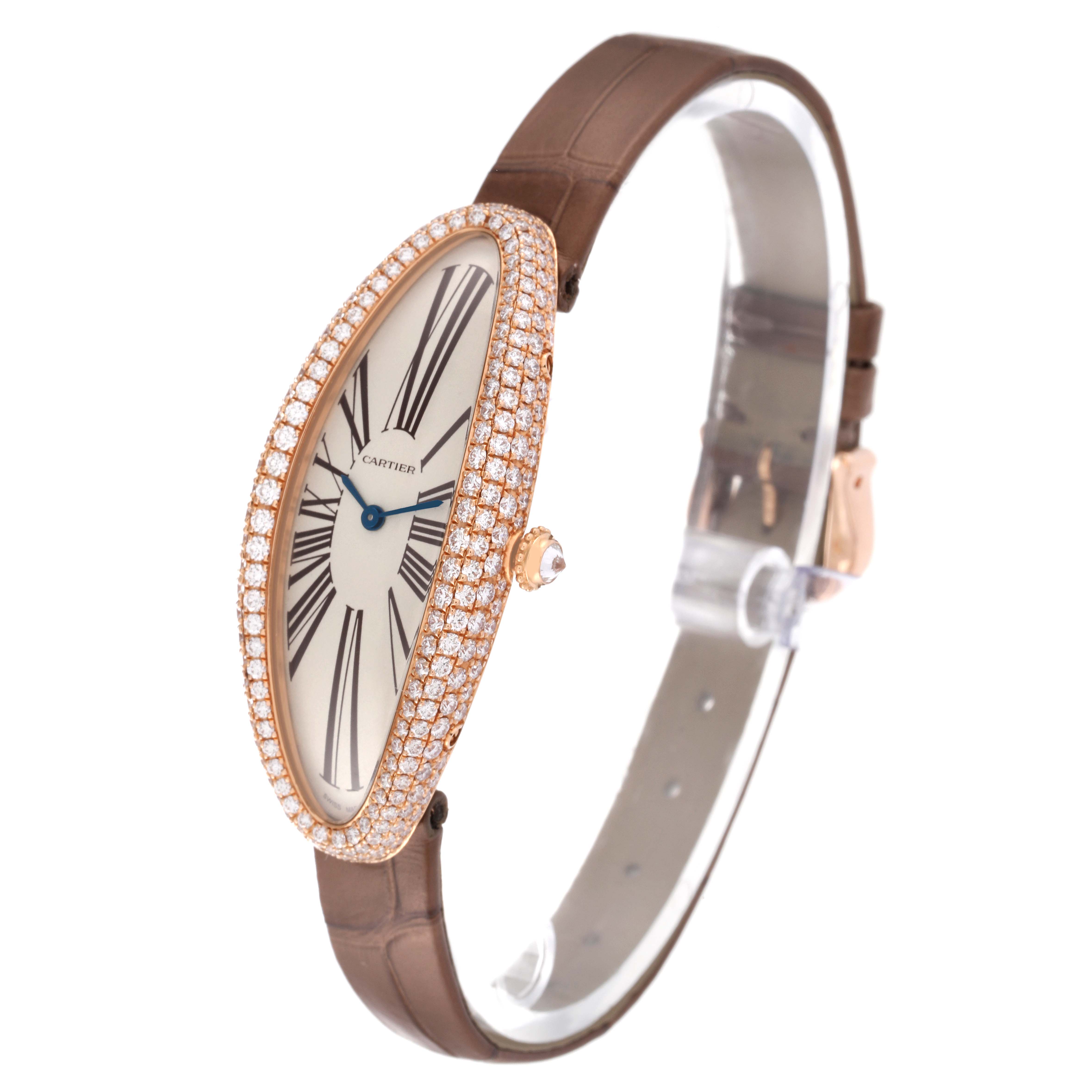 The Cartier Baignoire WJBA0006 Women's Rose Gold White Dial WJBA0006 Women's Rose Gold White Dial watch is shown in a side angle, displaying its oval face, diamond bezel, and leather strap.