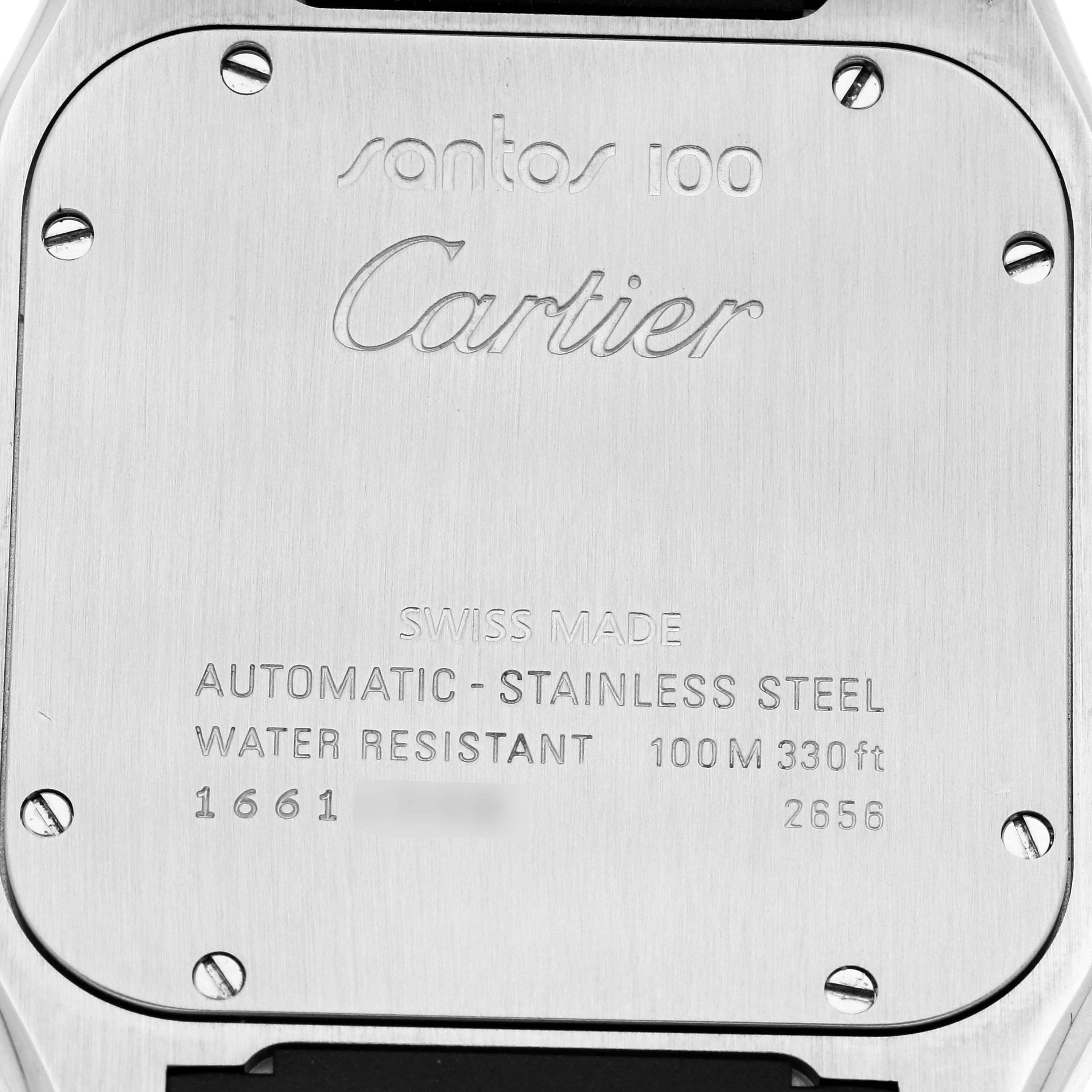 This image shows the back case of a Cartier Santos W20121U2 Men
s Stainless Steel Silver Dial W20121U2 Men
s Stainless Steel Silver Dial 100 watch, highlighting details like "Automatic - Stainless Steel" and "Water Resistant 100M."