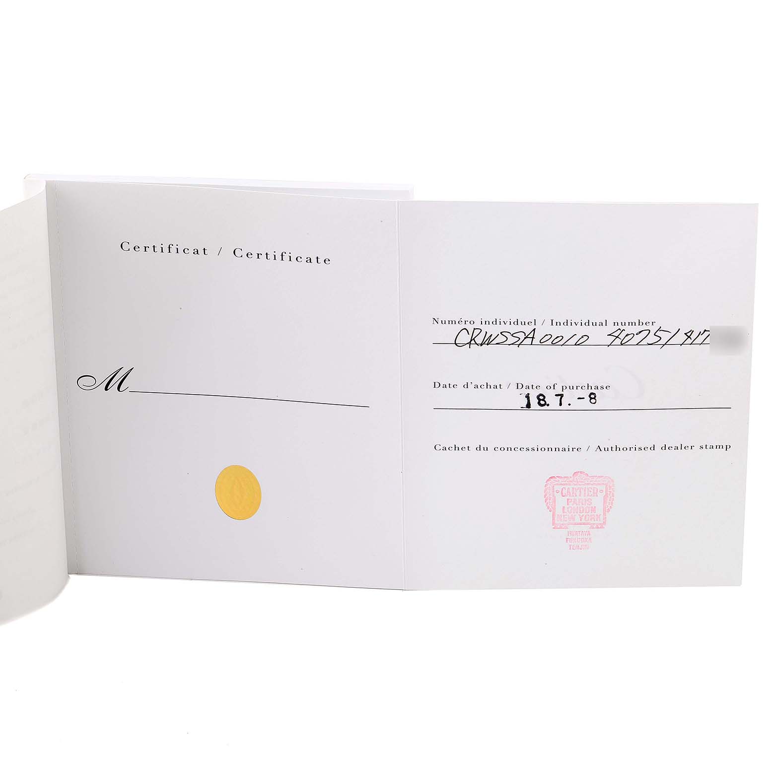 This image shows the certificate of authenticity and purchase details for a Cartier Santos WSSA0010 Men's Stainless Steel Silver Dial WSSA0010 Men's Stainless Steel Silver Dial model watch.