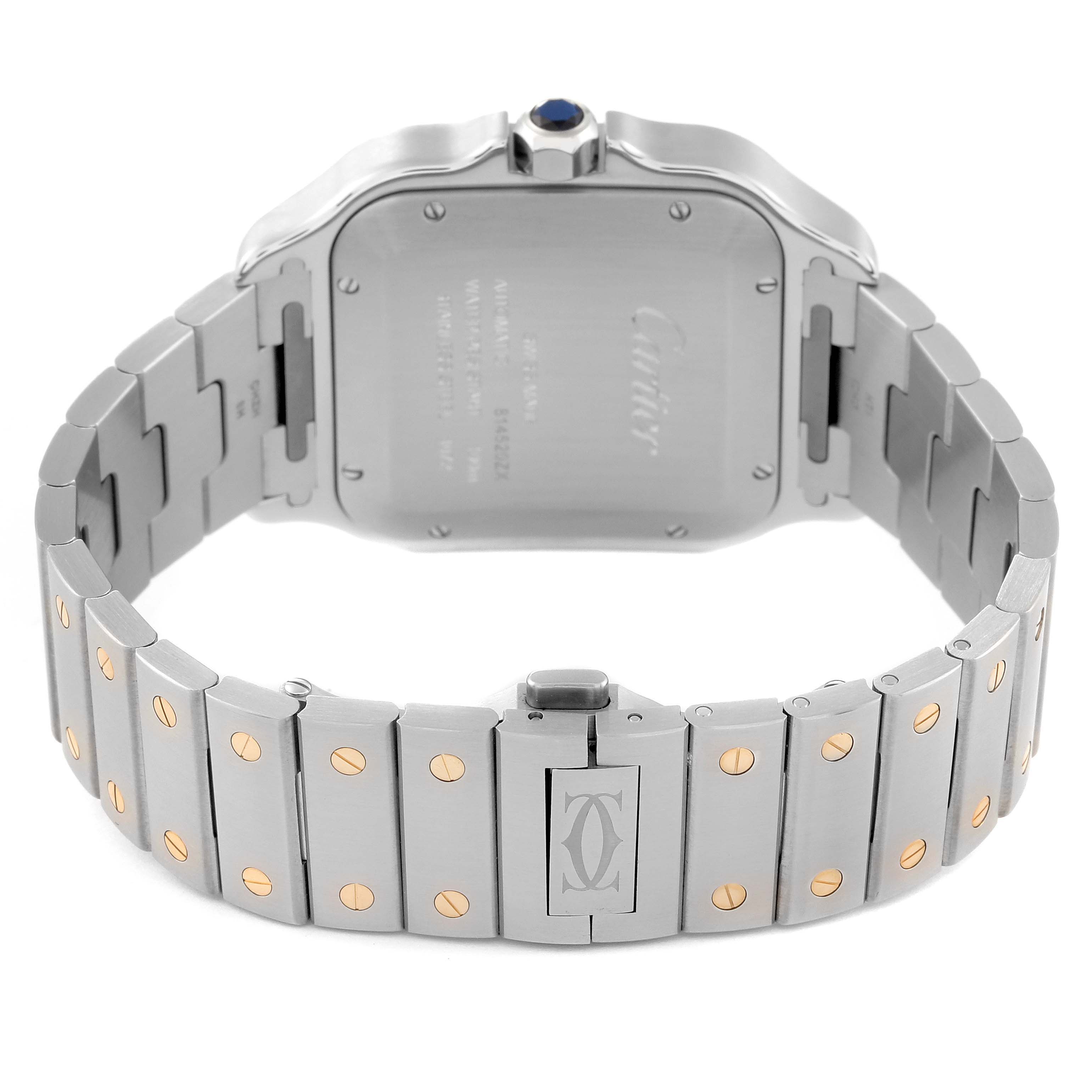 This image shows the back and band of a Santos model watch by Cartier, displaying the clasp and case back details.
