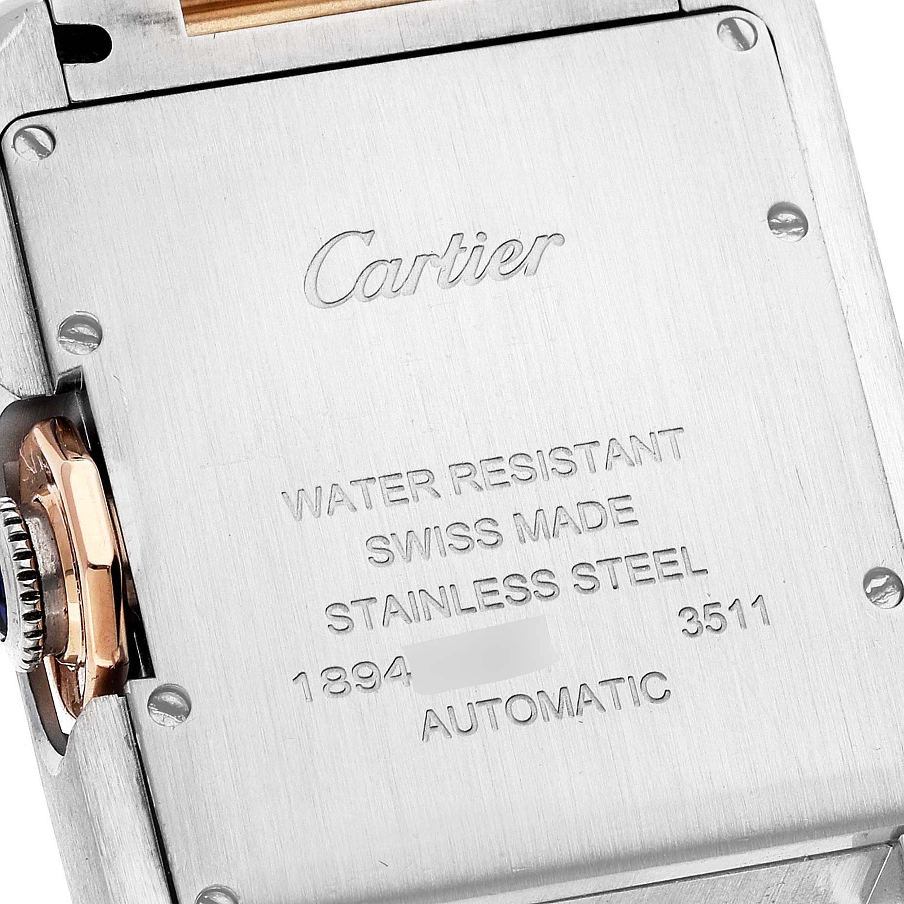 The image shows the back of a Cartier Tank Anglaise W5310007 Men
s Steel and Gold (two tone) Silver Dial W5310007 Men
s Steel and Gold (two tone) Silver Dial watch, highlighting its inscriptions and the crown on the side.