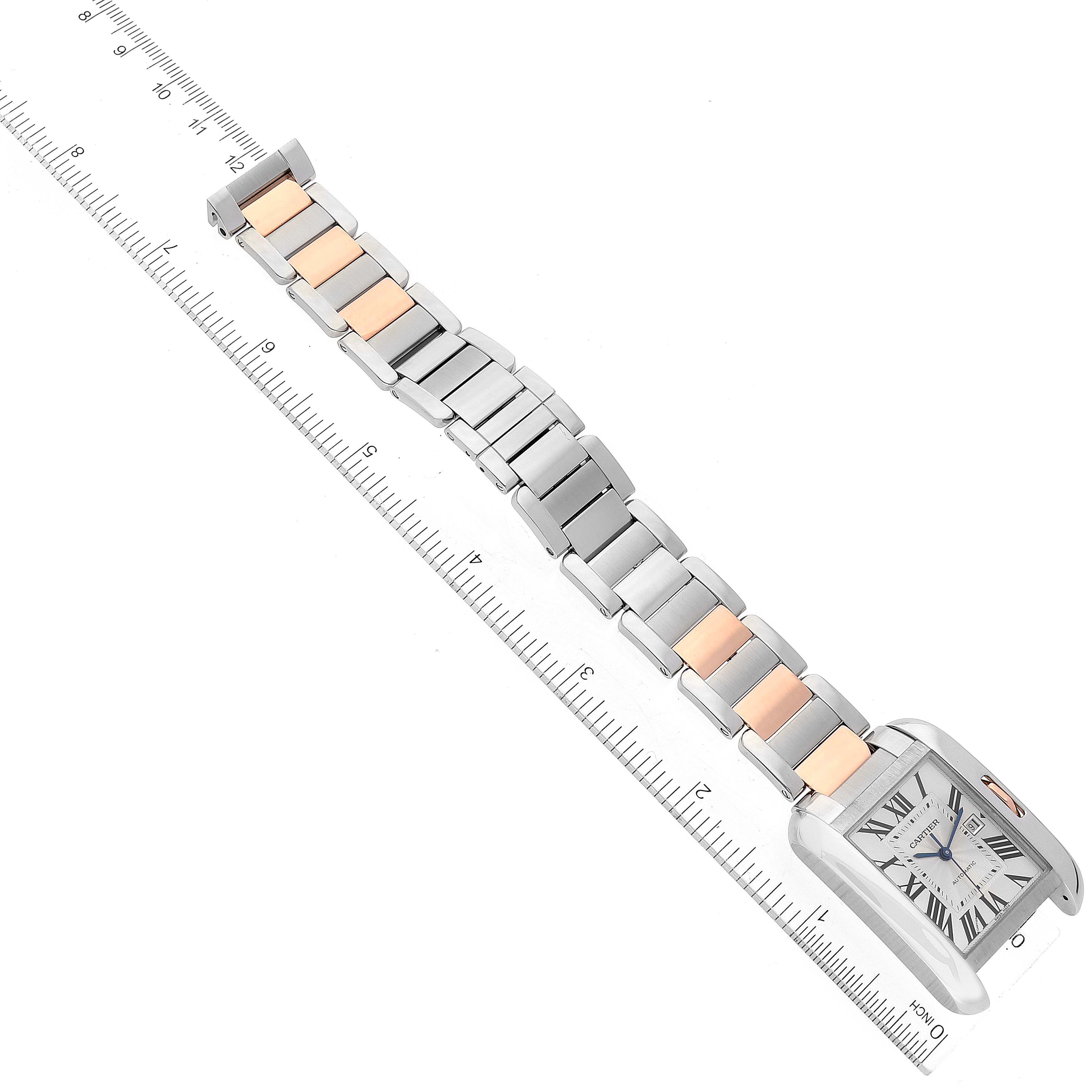 The image shows the Cartier Tank Anglaise W5310007 Men
s Steel and Gold (two tone) Silver Dial W5310007 Men
s Steel and Gold (two tone) Silver Dial watch laid flat with the face and band visible, measured against a ruler.