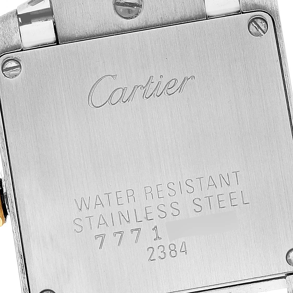 This image shows the back plate of the Tank Francaise watch by Cartier, highlighting the brand engraving and water resistance details.
