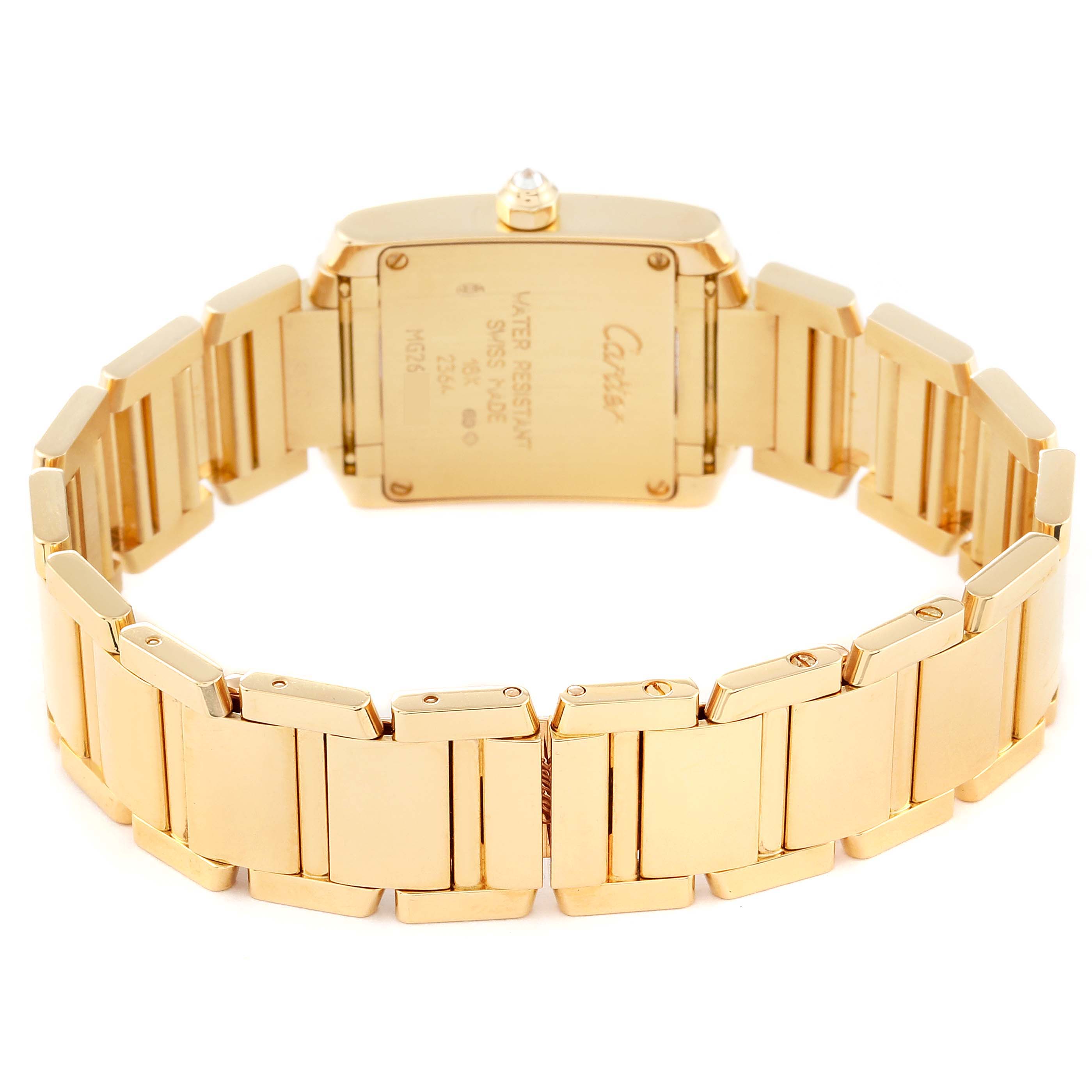 The image shows the back of a Tank Française watch by Cartier, focusing on the case back and gold bracelet links.