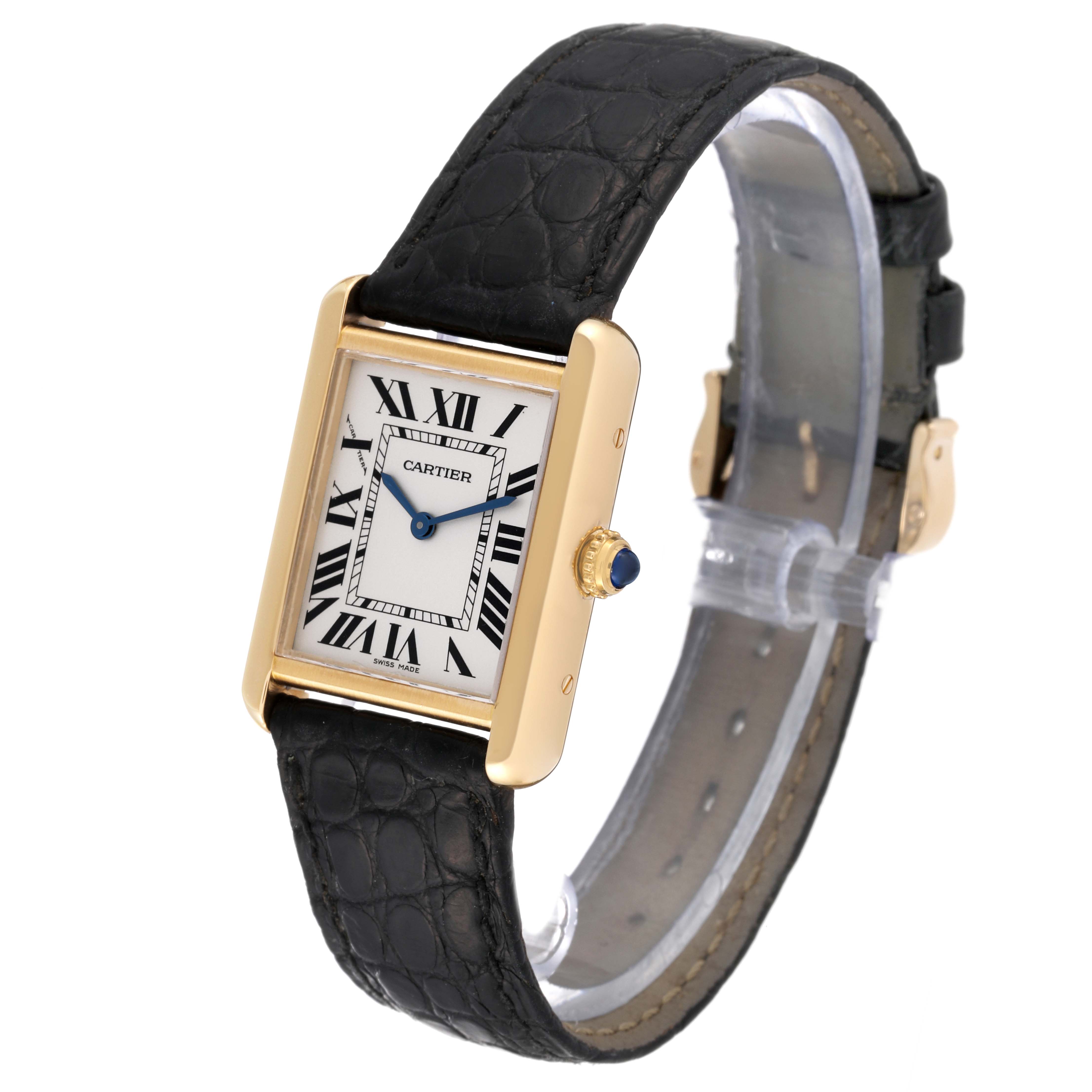 The Cartier Tank Solo W5200002 Women
s Steel and Gold (two tone) Silver Dial W5200002 Women
s Steel and Gold (two tone) Silver Dial watch is shown at a slight angle, displaying its rectangular face, Roman numerals, gold bezel, and leather strap.