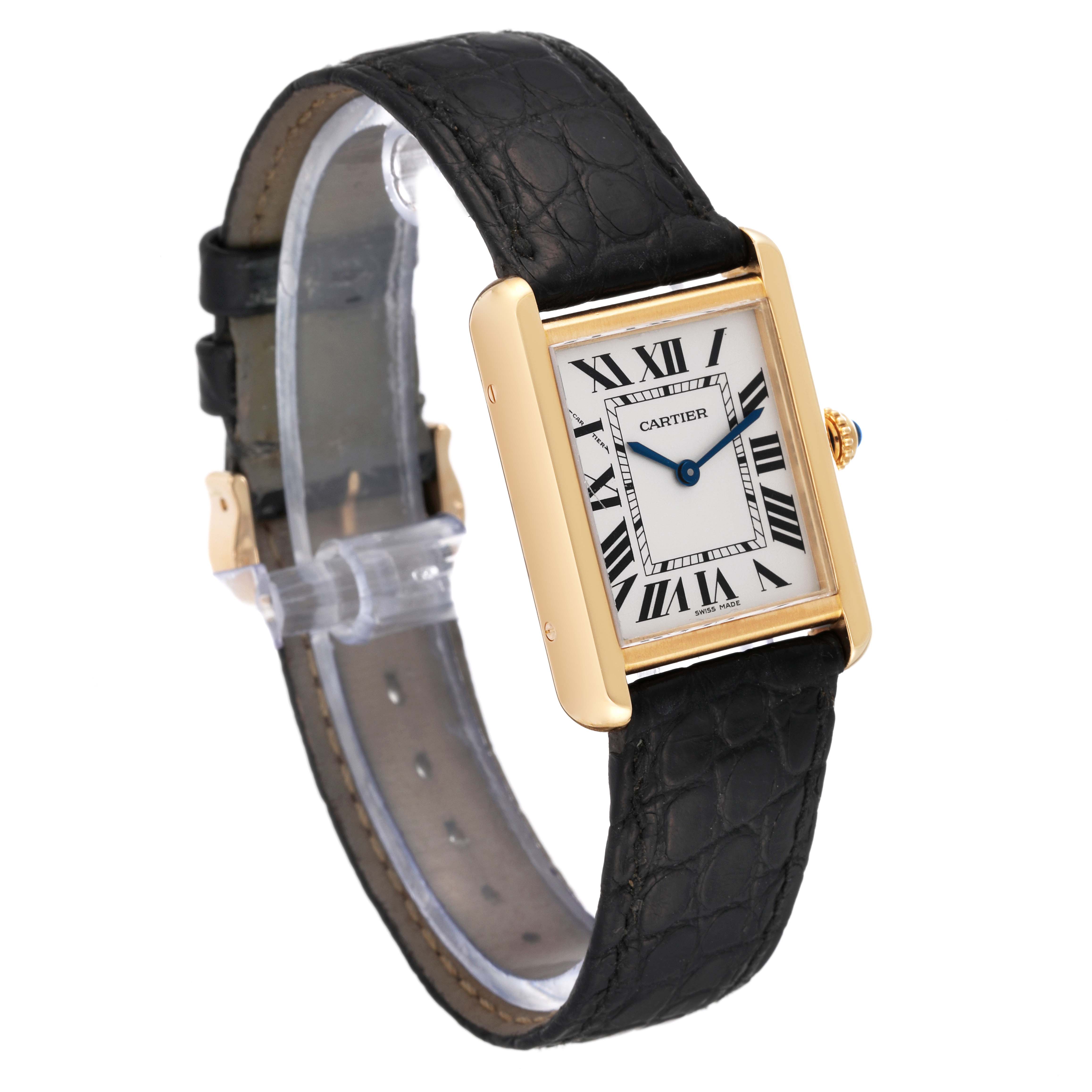 This Cartier Tank Solo W5200002 Women
s Steel and Gold (two tone) Silver Dial W5200002 Women
s Steel and Gold (two tone) Silver Dial watch is shown at an angle highlighting its rectangular face, Roman numerals, and black leather strap.