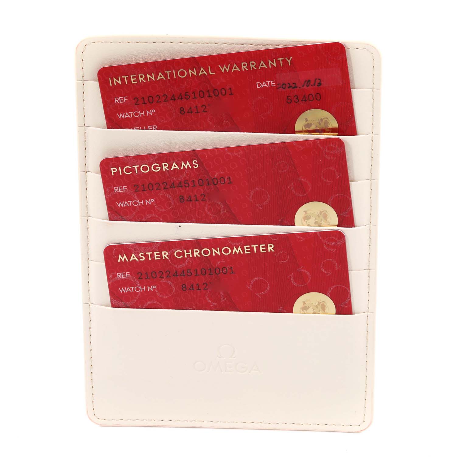 The image shows the warranty and informational cards for the Omega Seamaster 210.22.44.51.01.001 Men's Steel and Gold (two tone) Black Dial 210.22.44.51.01.001 Men's Steel and Gold (two tone) Black Dial model in a white cardholder.