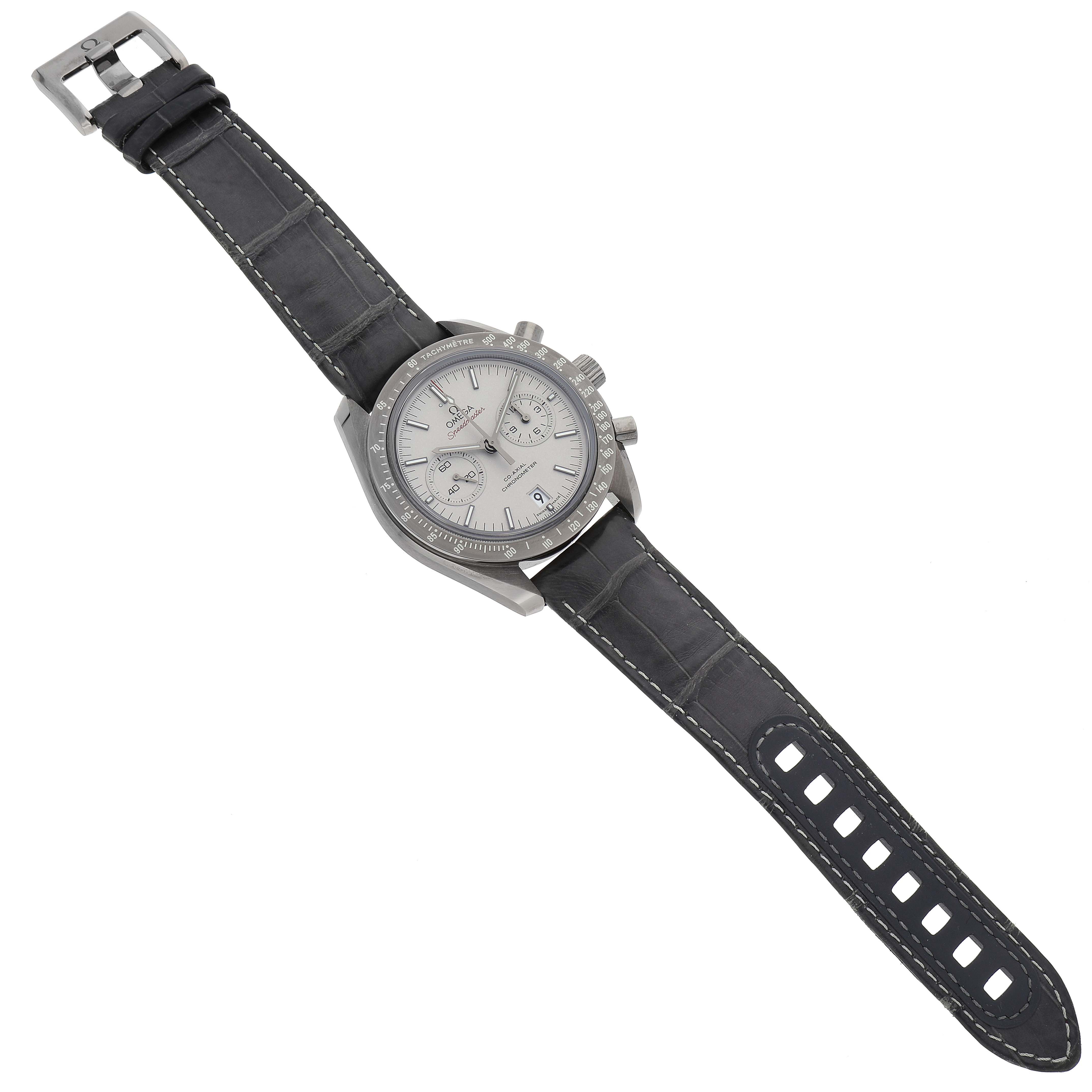 The image shows an Omega Speedmaster 311.93.44.51.99.001 Men's Ceramic Silver Dial 311.93.44.51.99.001 Men's Ceramic Silver Dial watch lying flat, fully extended, displaying the face, case, strap, and buckle.