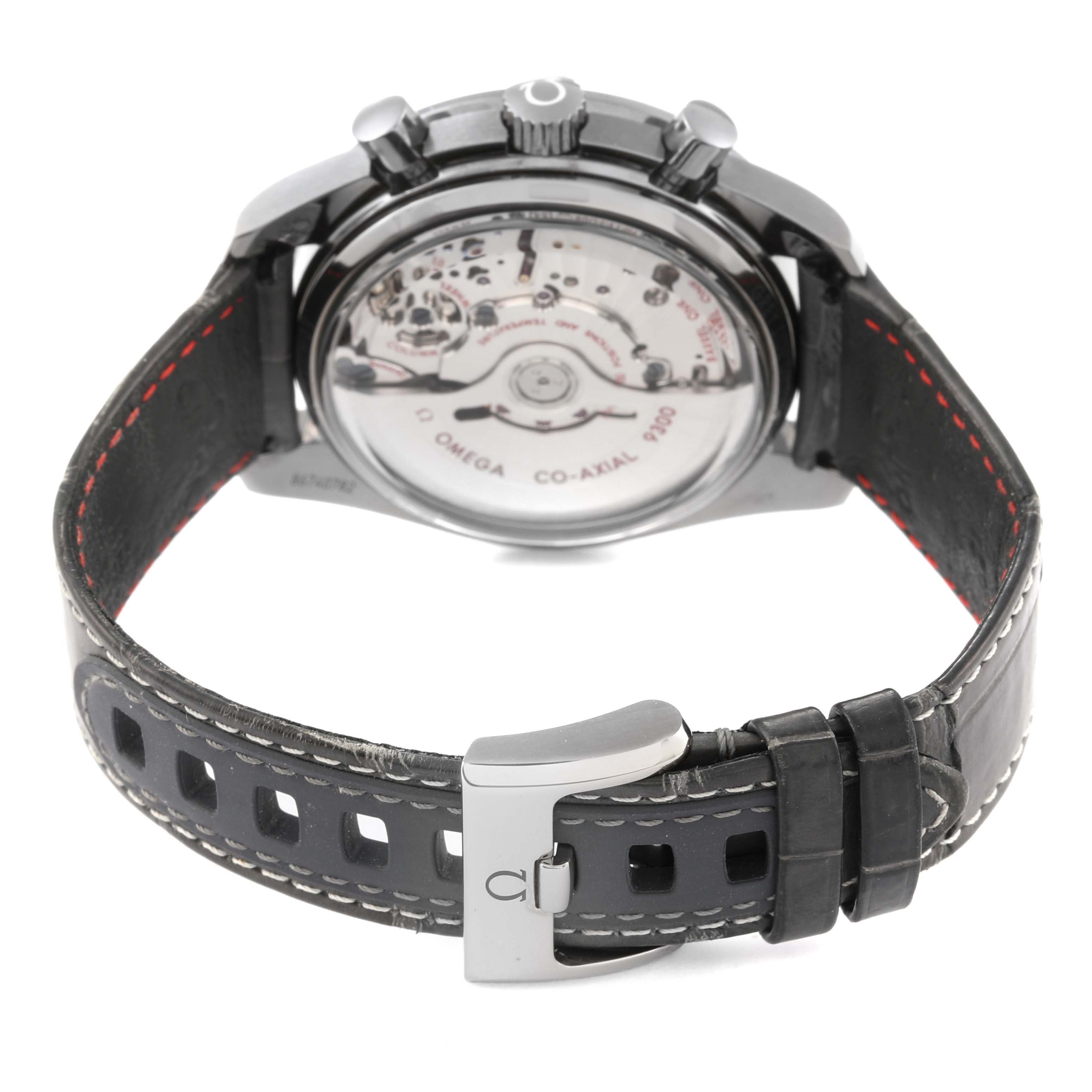 The image shows the backside of the Omega Speedmaster 311.93.44.51.99.001 Men's Ceramic Silver Dial 311.93.44.51.99.001 Men's Ceramic Silver Dial watch, focusing on the movement, case back, and strap from a rear angle.