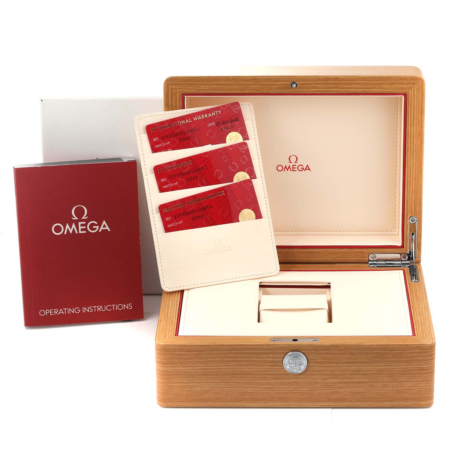 The image displays an Omega Speedmaster 329.30.44.51.04.001 Men
s Stainless Steel White Dial 329.30.44.51.04.001 Men
s Stainless Steel White Dial watch box, operating instructions, and warranty cards.