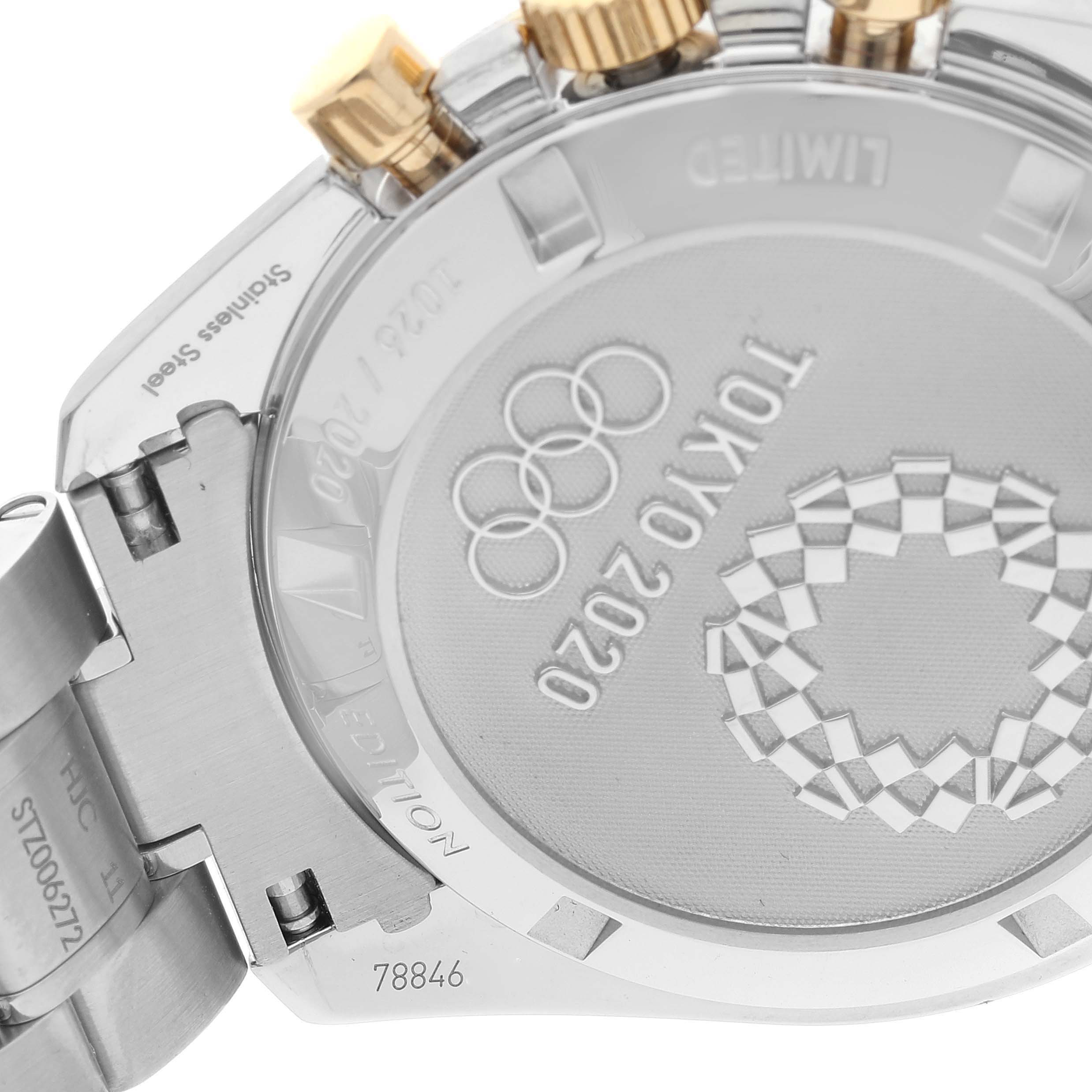 This image shows the case back of the Omega Speedmaster 522.20.42.30.01.001 Men's Steel and Gold (two tone) Black Dial 522.20.42.30.01.001 Men's Steel and Gold (two tone) Black Dial watch, highlighting the Tokyo 2020 Olympics design and some gold-colored crown parts.