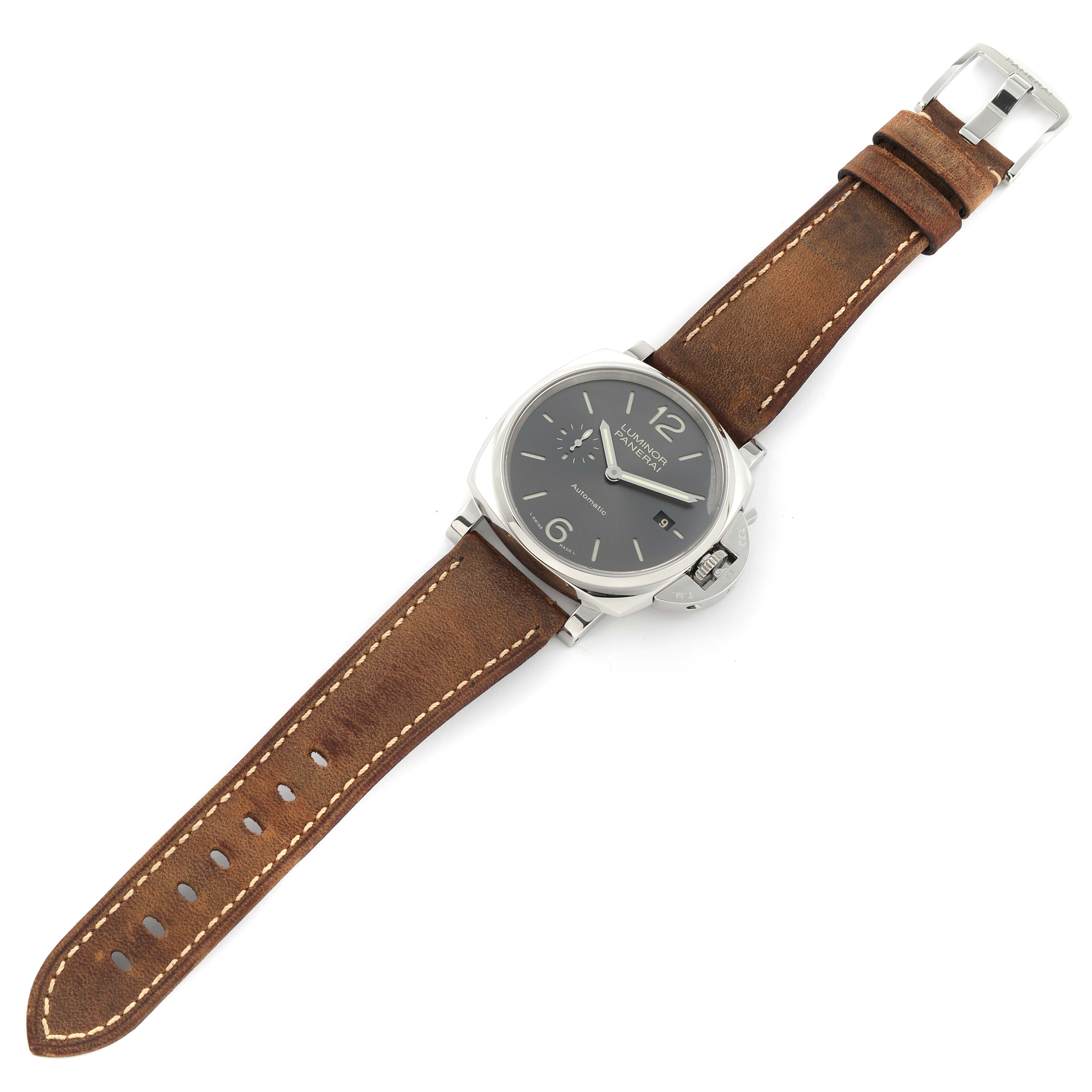 This image shows a Panerai Luminor PAM00904 Men's Stainless Steel Black Dial PAM00904 Men's Stainless Steel Black Dial watch from a top-down angle, highlighting its brown leather strap and black dial.