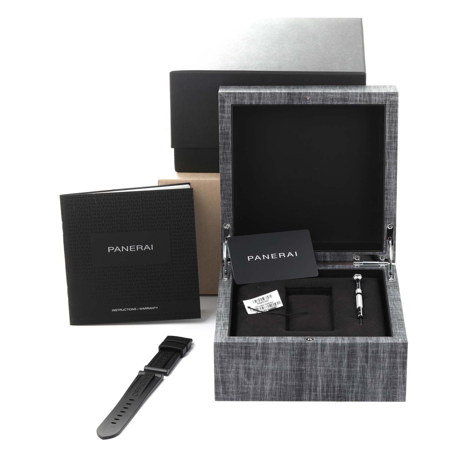 The image shows an open Panerai Luminor PAM01037 Men's Ceramic Grey Dial PAM01037 Men's Ceramic Grey Dial watch box, a spare strap, a manual, and a warranty card.